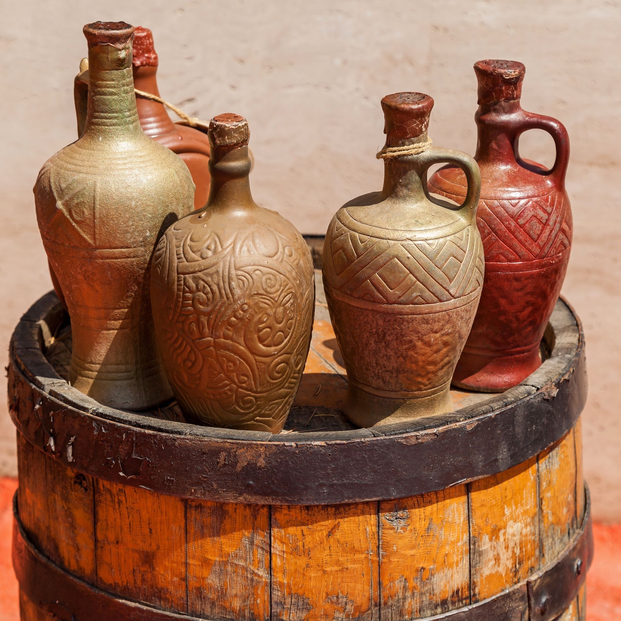 Wine barrel with ancient wine jars