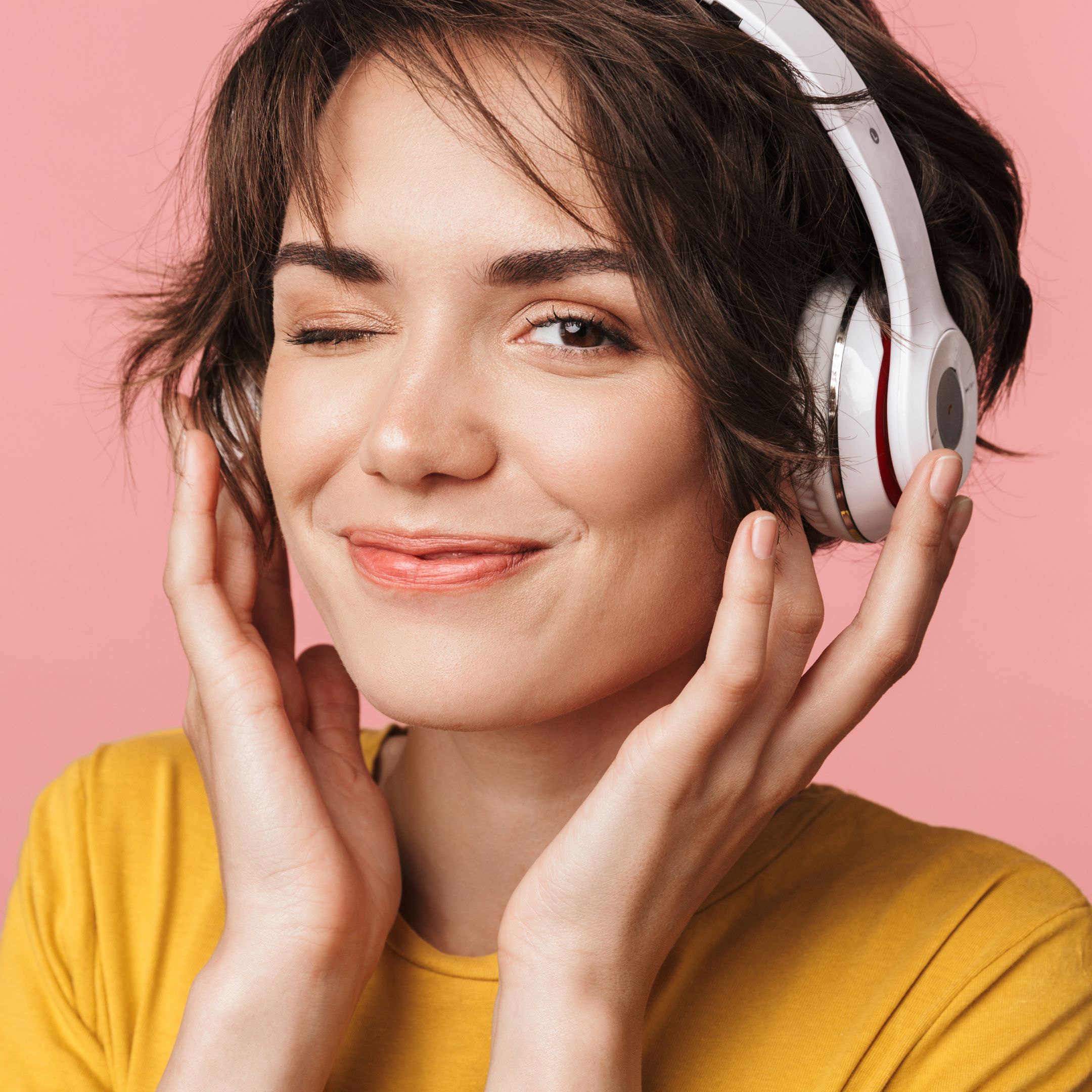 Young lady with headphones smiling